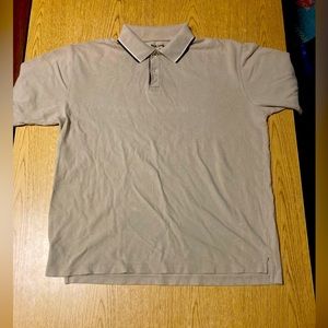 I’m selling a adults L/G footlocker Button Shirt